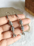 German Silver Buddha Hook Earrings | AMOLA