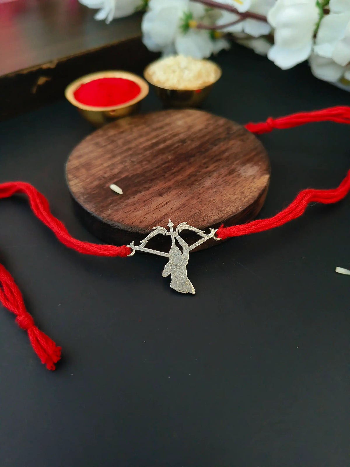 Silver Look Ram Rakhi with Bow Accent | AMOLA