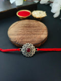 Antique Floral Rakhi with Red Center Stone | AMOLA