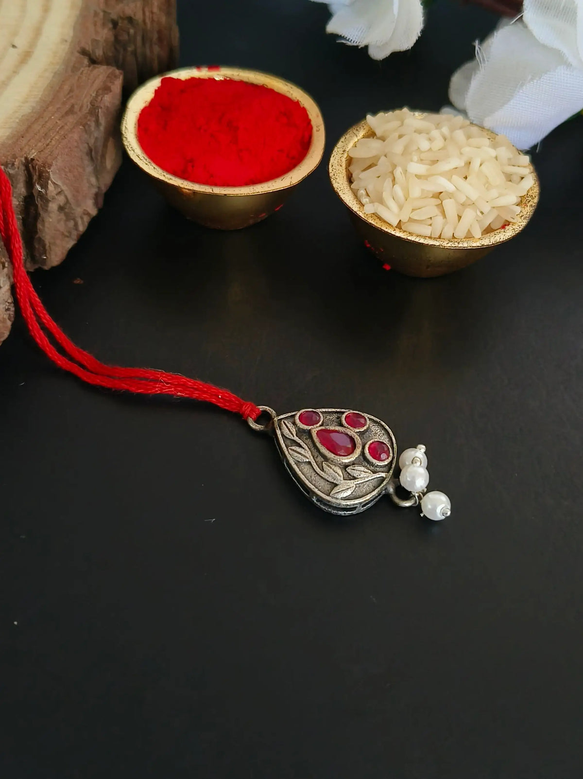 Oxidised Red Pan Leaf Lumba Rakhi | AMOLA