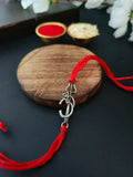 Silver Om Trishul Charm Rakhi Blessing | AMOLA