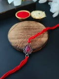 Red Stone Oval Rakhi in Silver Finish | AMOLA