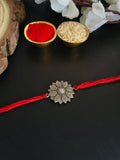 Antique Floral Charm Rakhi in Oxidised Finish | AMOLA