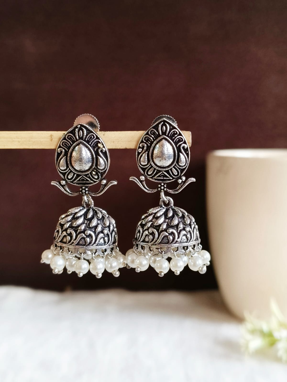 Elegant German Silver Pearl Jhumka Earrings with Intricate Floral Design | Sarichka